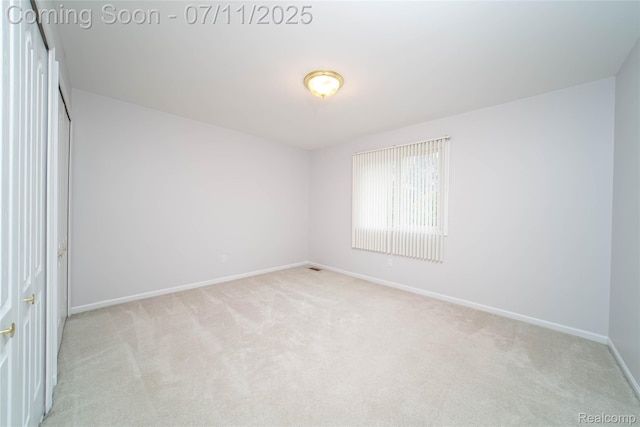 24145 Windridge Ln, Novi, MI 48374 - unfurnished bedroom with carpet flooring and baseboards