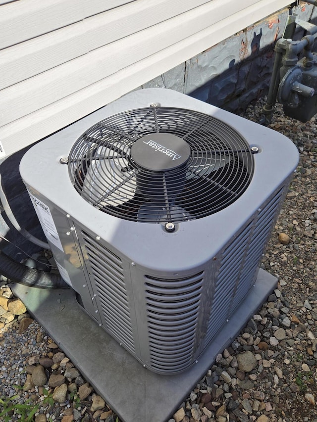 7 Hewitt St, Quincy, MI 49082 - exterior view of a central air condition unit and gas meter