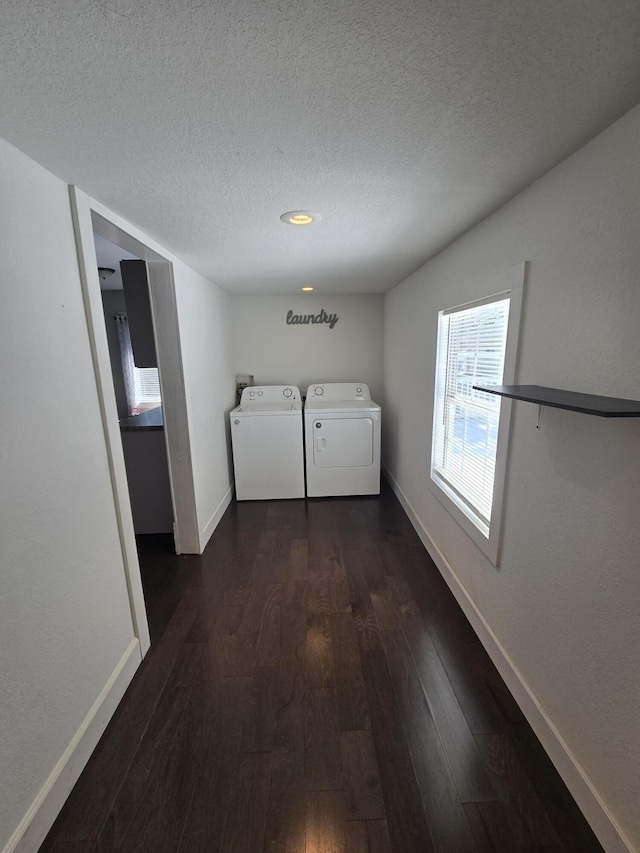 7 Hewitt St, Quincy, MI 49082 - laundry room with washing machine and dryer, dark wood-style flooring, a textured ceiling, and recessed lighting