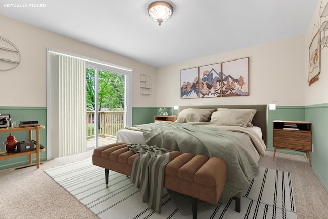 5304 Driftwood Ave, Kalamazoo, MI 49009 - carpeted bedroom featuring access to outside and wainscoting