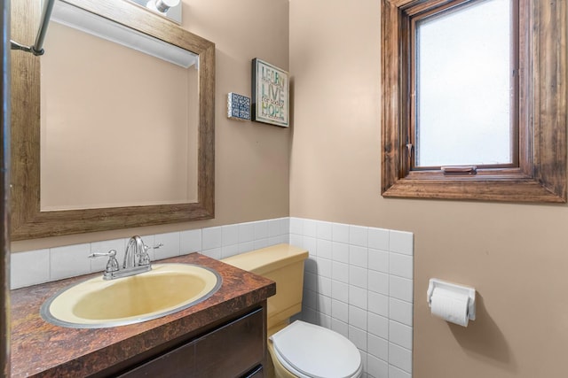 5304 Driftwood Ave, Kalamazoo, MI 49009 - half bathroom with vanity and tile walls