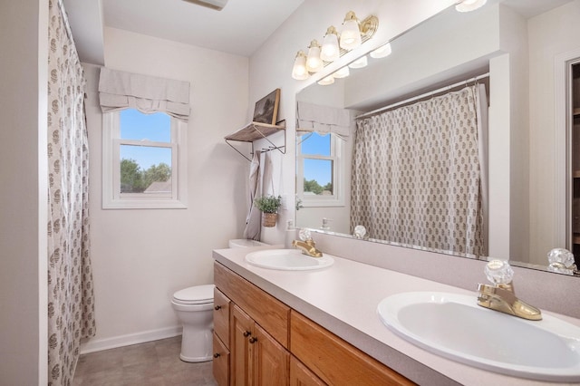 5665 Koster Dr SW, Wyoming, MI 49418 - full bath featuring plenty of natural light, double vanity, and a shower with shower curtain