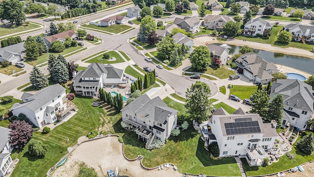 5665 Koster Dr SW, Wyoming, MI 49418 - aerial perspective of suburban area with a large body of water