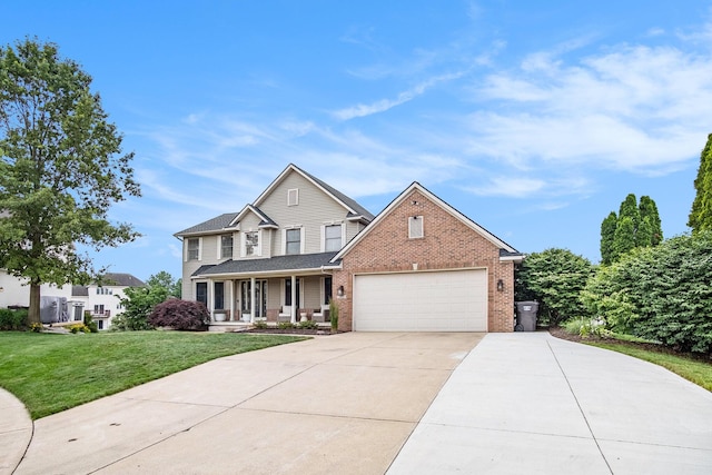 5665 Koster Dr SW, Wyoming, MI 49418 - traditional-style home featuring a porch, brick siding, a front yard, a garage, and concrete driveway