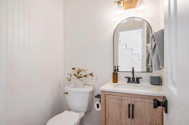 5665 Koster Dr SW, Wyoming, MI 49418 - bathroom featuring toilet and vanity