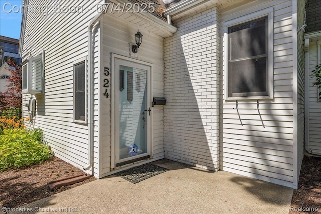 524 Oakland Ave, Birmingham, MI 48009 - property entrance featuring brick siding