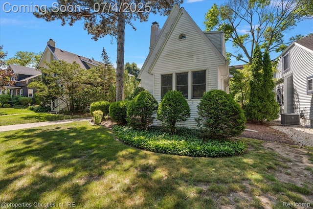 524 Oakland Ave, Birmingham, MI 48009 - view of side of property featuring a chimney and a yard
