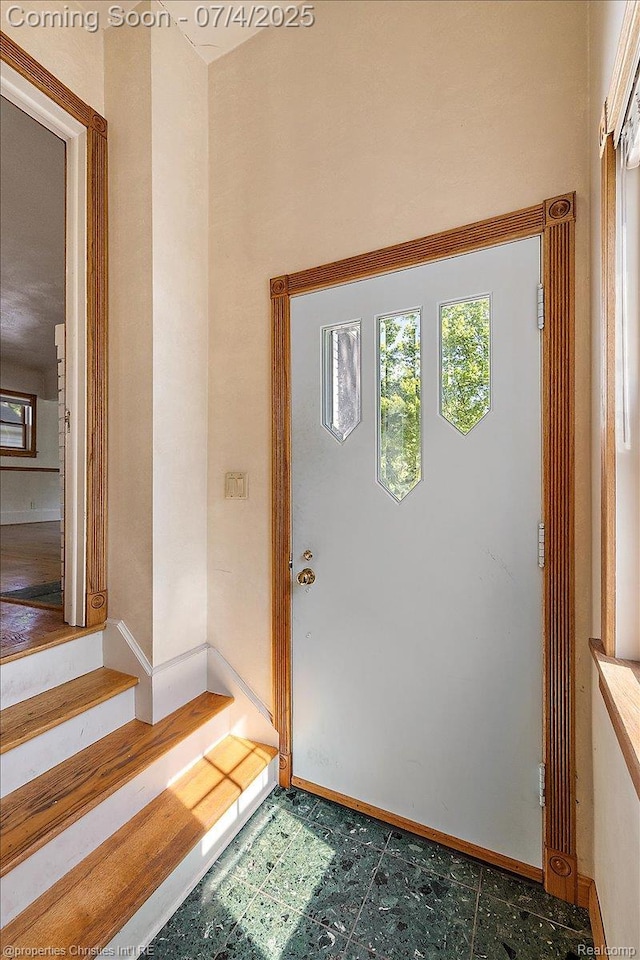 524 Oakland Ave, Birmingham, MI 48009 - foyer entrance with baseboards and stairs