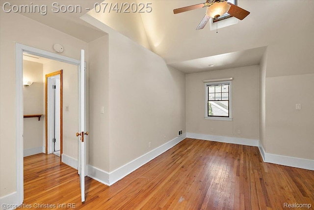 524 Oakland Ave, Birmingham, MI 48009 - empty room featuring hardwood / wood-style flooring, a ceiling fan, and a smoke detector