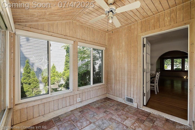 524 Oakland Ave, Birmingham, MI 48009 - unfurnished sunroom with lofted ceiling and arched walkways