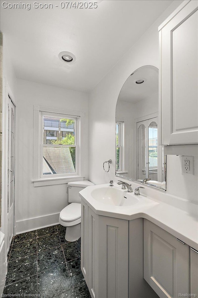 524 Oakland Ave, Birmingham, MI 48009 - bathroom featuring vanity and toilet