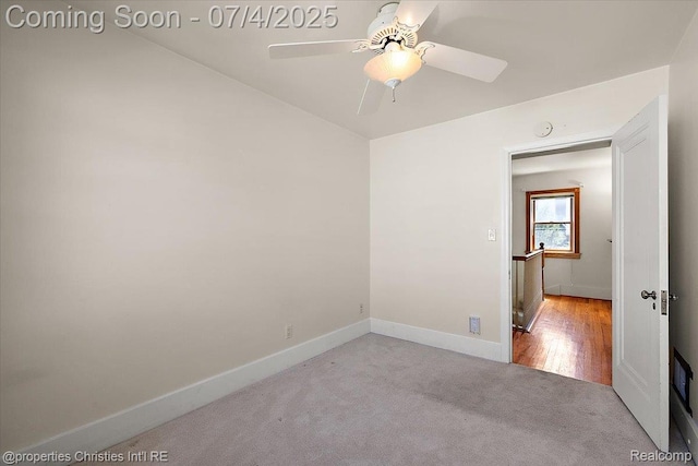 524 Oakland Ave, Birmingham, MI 48009 - unfurnished room with carpet flooring, a ceiling fan, and a smoke detector
