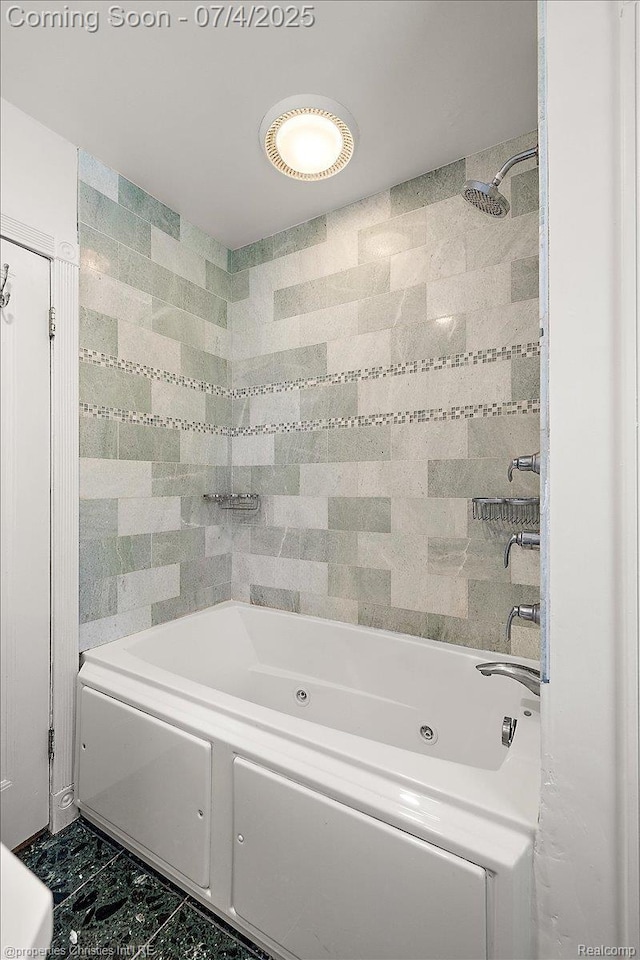 524 Oakland Ave, Birmingham, MI 48009 - bathroom with a tub with jets, marble finish flooring, and a shower