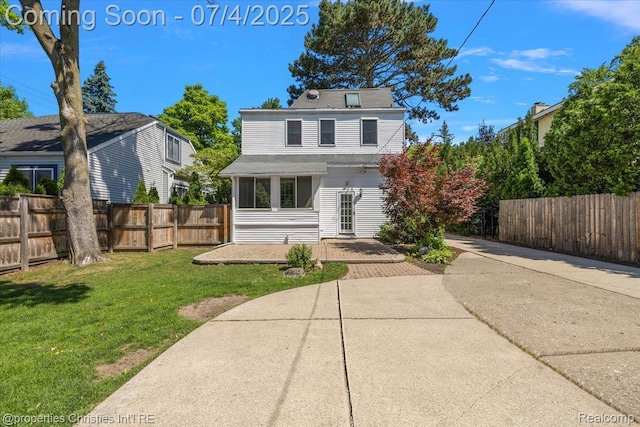 524 Oakland Ave, Birmingham, MI 48009 - rear view of house featuring a fenced backyard and a patio