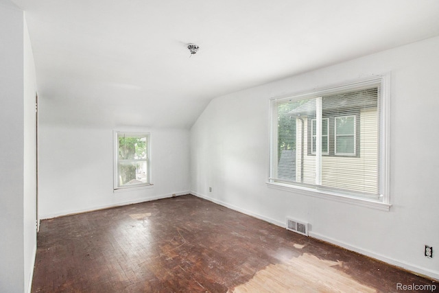 1612 Euclid Ave, Flint, MI 48503 - additional living space with wood finished floors and vaulted ceiling
