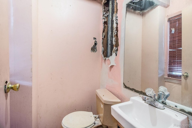 1612 Euclid Ave, Flint, MI 48503 - half bath with a sink and toilet