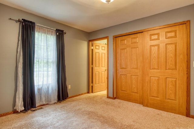 19085 Joslin Cir, Big Rapids, MI 49307 - unfurnished bedroom featuring carpet and a closet