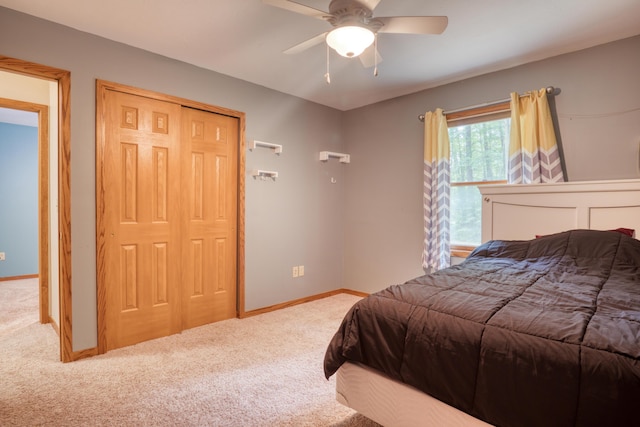 19085 Joslin Cir, Big Rapids, MI 49307 - bedroom with carpet floors, a closet, and ceiling fan