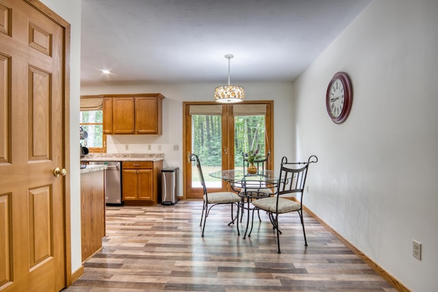 19085 Joslin Cir, Big Rapids, MI 49307 - dining area with light wood-style floors and healthy amount of natural light