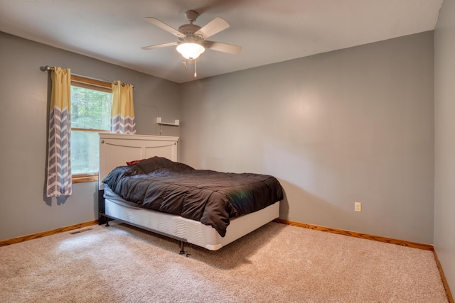 19085 Joslin Cir, Big Rapids, MI 49307 - carpeted bedroom with baseboards and ceiling fan