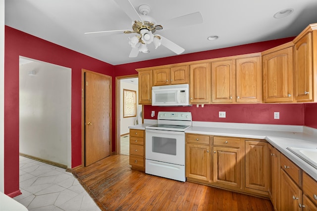 7906 N 43rd St, Augusta, MI 49012 - kitchen featuring white appliances, a ceiling fan, light countertops, brown cabinetry, and recessed lighting