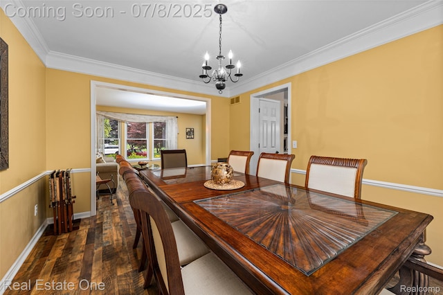17734 Huron Dr, Macomb, MI 48042 - dining room featuring ornamental molding, a chandelier, and dark wood-type flooring