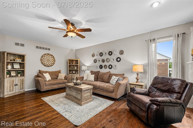 17734 Huron Dr, Macomb, MI 48042 - living area featuring a ceiling fan and dark wood-style flooring