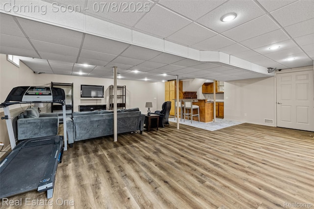17734 Huron Dr, Macomb, MI 48042 - exercise area with wood finished floors and a drop ceiling