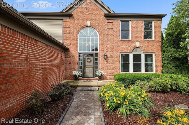 17734 Huron Dr, Macomb, MI 48042 - property entrance featuring brick siding