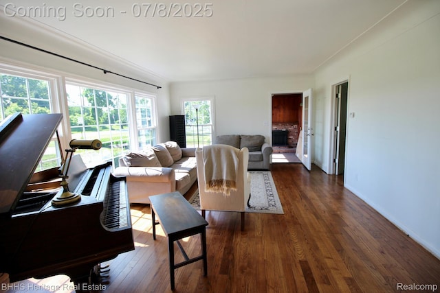 4201 N Burkhart Rd, Howell, MI 48855 - living area featuring hardwood / wood-style flooring and baseboards