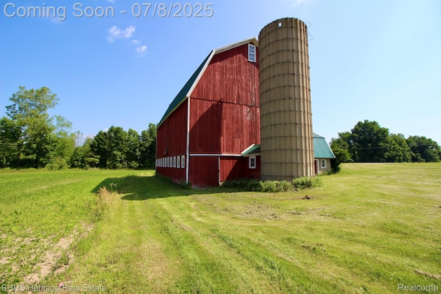 4201 N Burkhart Rd, Howell, MI 48855 - view of barn with a lawn