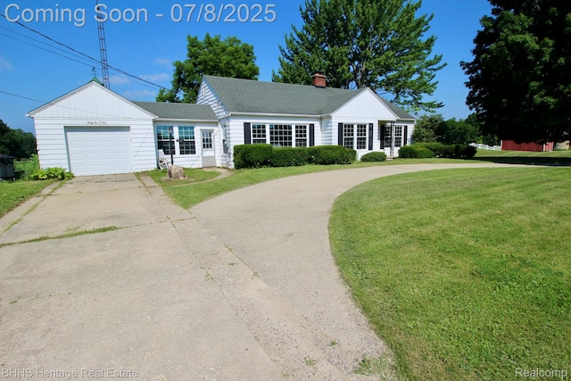 4201 N Burkhart Rd, Howell, MI 48855 - view of front of property with driveway, a front lawn, a chimney, and a garage