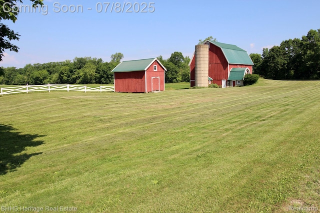 4201 N Burkhart Rd, Howell, MI 48855 - view of yard with a barn and an outbuilding