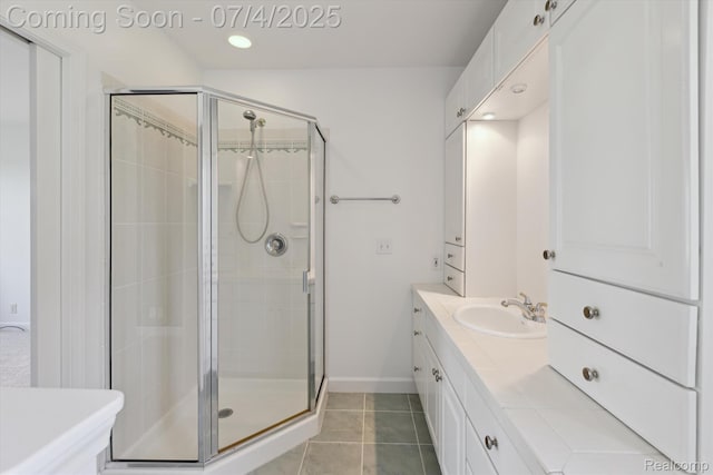 10934 Baker Rd, Frankenmuth, MI 48734 - bathroom with a stall shower, vanity, tile patterned floors, and recessed lighting