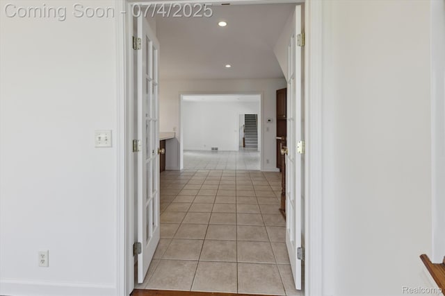 10934 Baker Rd, Frankenmuth, MI 48734 - corridor featuring light tile patterned floors and recessed lighting