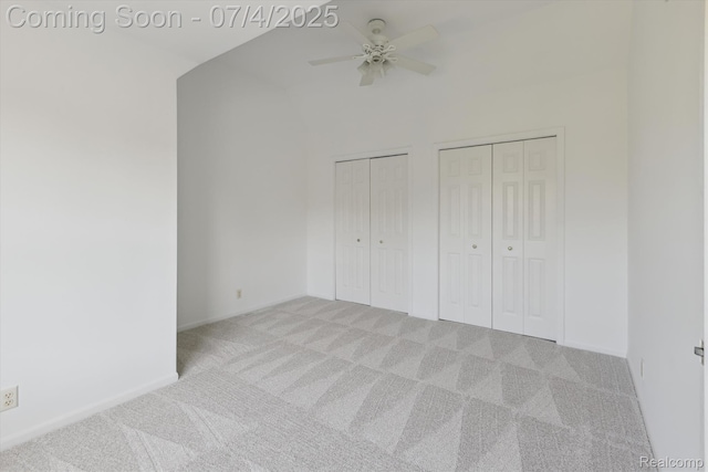 10934 Baker Rd, Frankenmuth, MI 48734 - unfurnished bedroom with carpet flooring, multiple closets, and ceiling fan