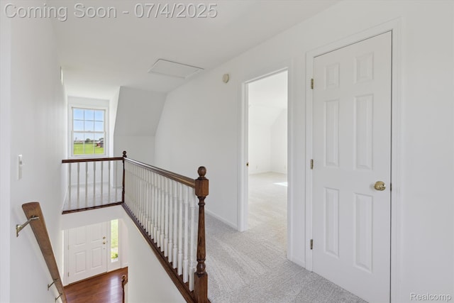 10934 Baker Rd, Frankenmuth, MI 48734 - corridor featuring an upstairs landing, carpet flooring, and attic access
