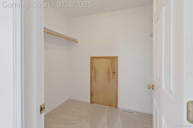 10934 Baker Rd, Frankenmuth, MI 48734 - walk in closet featuring carpet