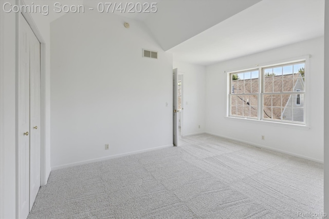 10934 Baker Rd, Frankenmuth, MI 48734 - unfurnished bedroom with carpet and lofted ceiling