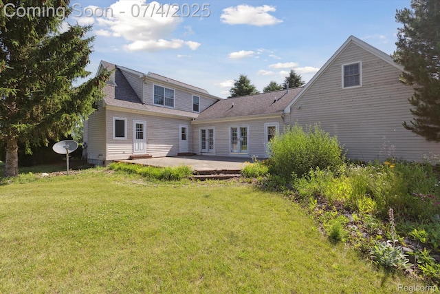 10934 Baker Rd, Frankenmuth, MI 48734 - rear view of house featuring a patio area, french doors, and a yard