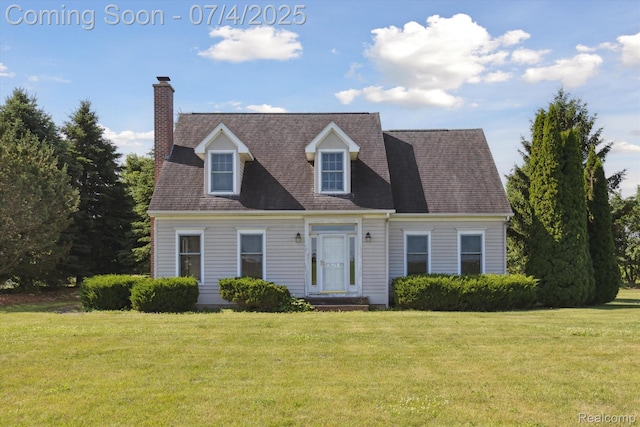 10934 Baker Rd, Frankenmuth, MI 48734 - cape cod house with a front yard and a chimney