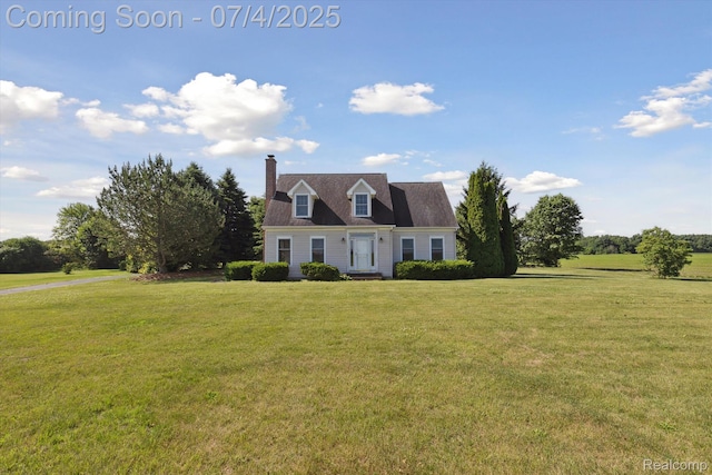10934 Baker Rd, Frankenmuth, MI 48734 - cape cod house with a front yard and a chimney