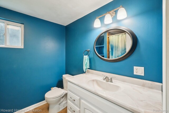 6830 Dixie Hwy, Clarkston, MI 48346 - bathroom featuring vanity and a shower with shower curtain