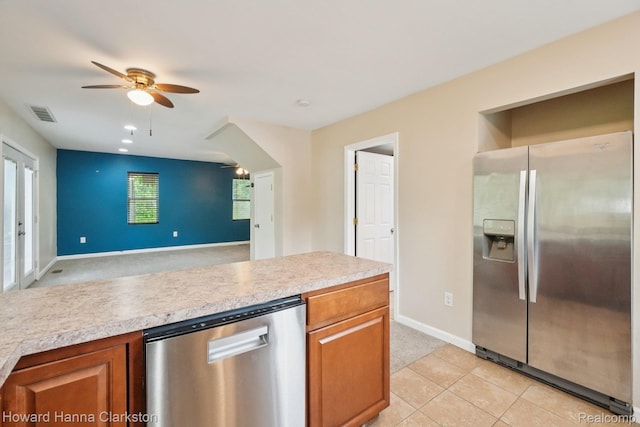 6830 Dixie Hwy, Clarkston, MI 48346 - kitchen featuring stainless steel appliances, ceiling fan, light countertops, and light carpet