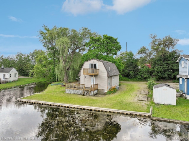 6830 Dixie Hwy, Clarkston, MI 48346 - view of green lawn with a balcony, a storage shed, a deck with water view, and view of scattered trees