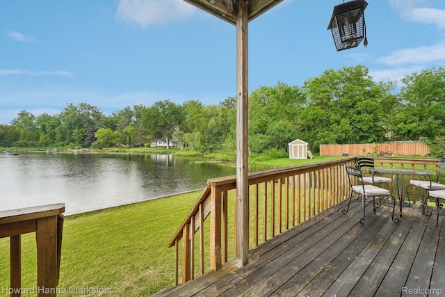 6830 Dixie Hwy, Clarkston, MI 48346 - wooden terrace with a storage unit, a water view, and view of scattered trees