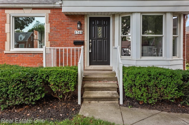 1746 N Lafayette St, Dearborn, MI 48128 - doorway to property featuring brick siding