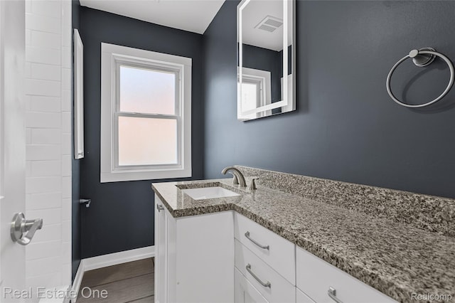 1746 N Lafayette St, Dearborn, MI 48128 - full bathroom with vanity and wood finished floors