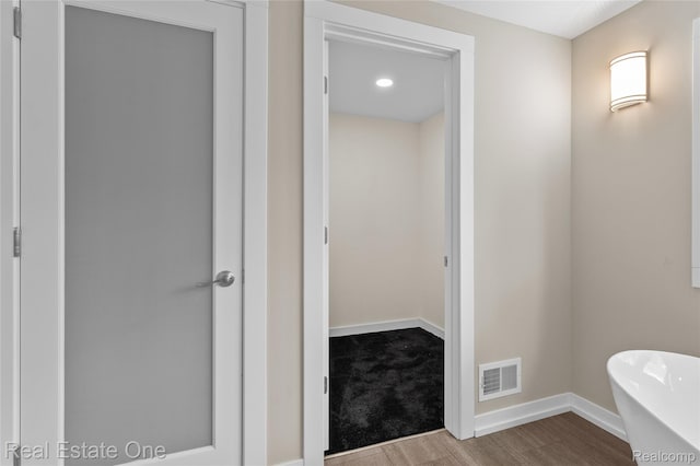 1746 N Lafayette St, Dearborn, MI 48128 - full bath featuring a freestanding tub and wood finished floors