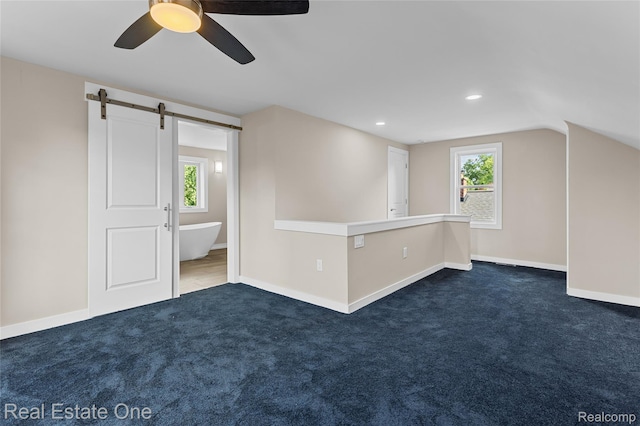 1746 N Lafayette St, Dearborn, MI 48128 - bonus room featuring dark carpet, a barn door, healthy amount of natural light, lofted ceiling, and recessed lighting